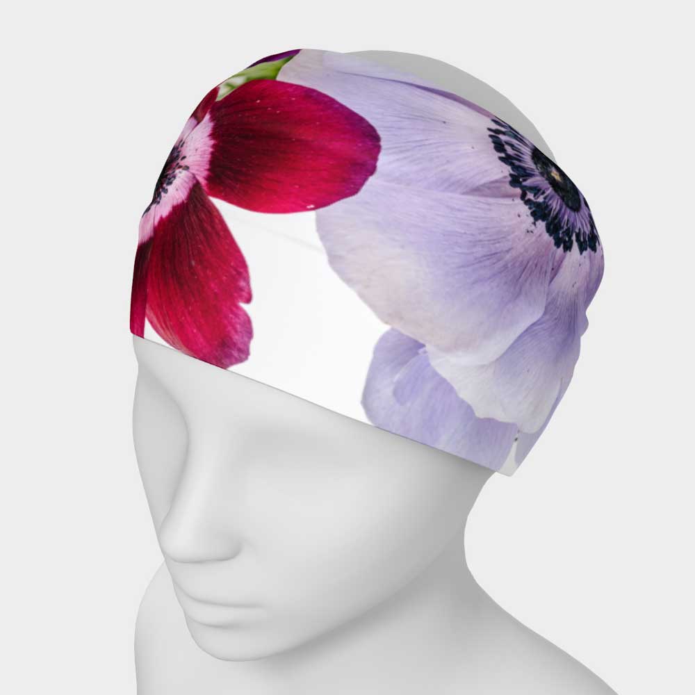 Designer headband showing lavender and vibrant magenta anemone flowers shown on white mannequin. 