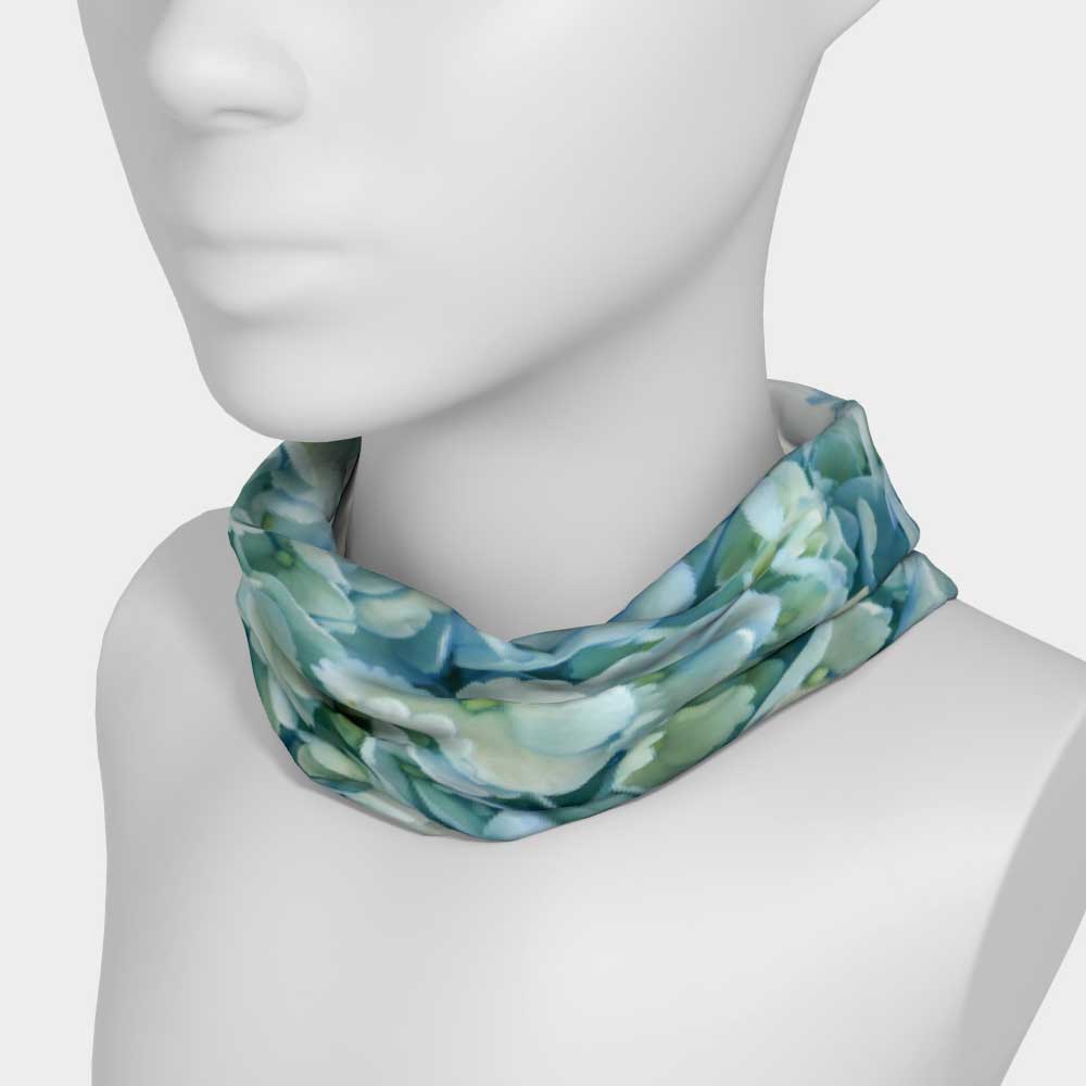 Stretch floral headband with blue hydrangea flowers shown as neck scarf on white mannequin.
