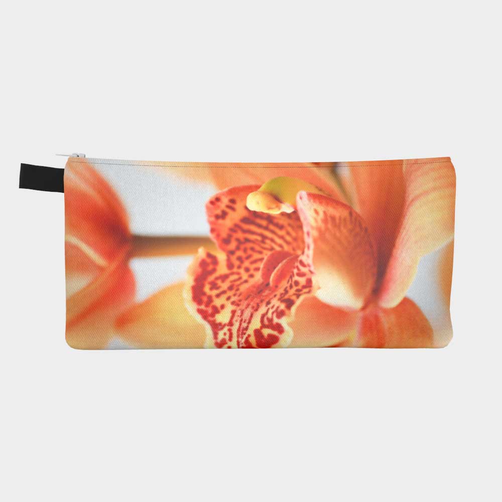 Zippered pouch with close-up image of vibrant orange orchid flower, back view
